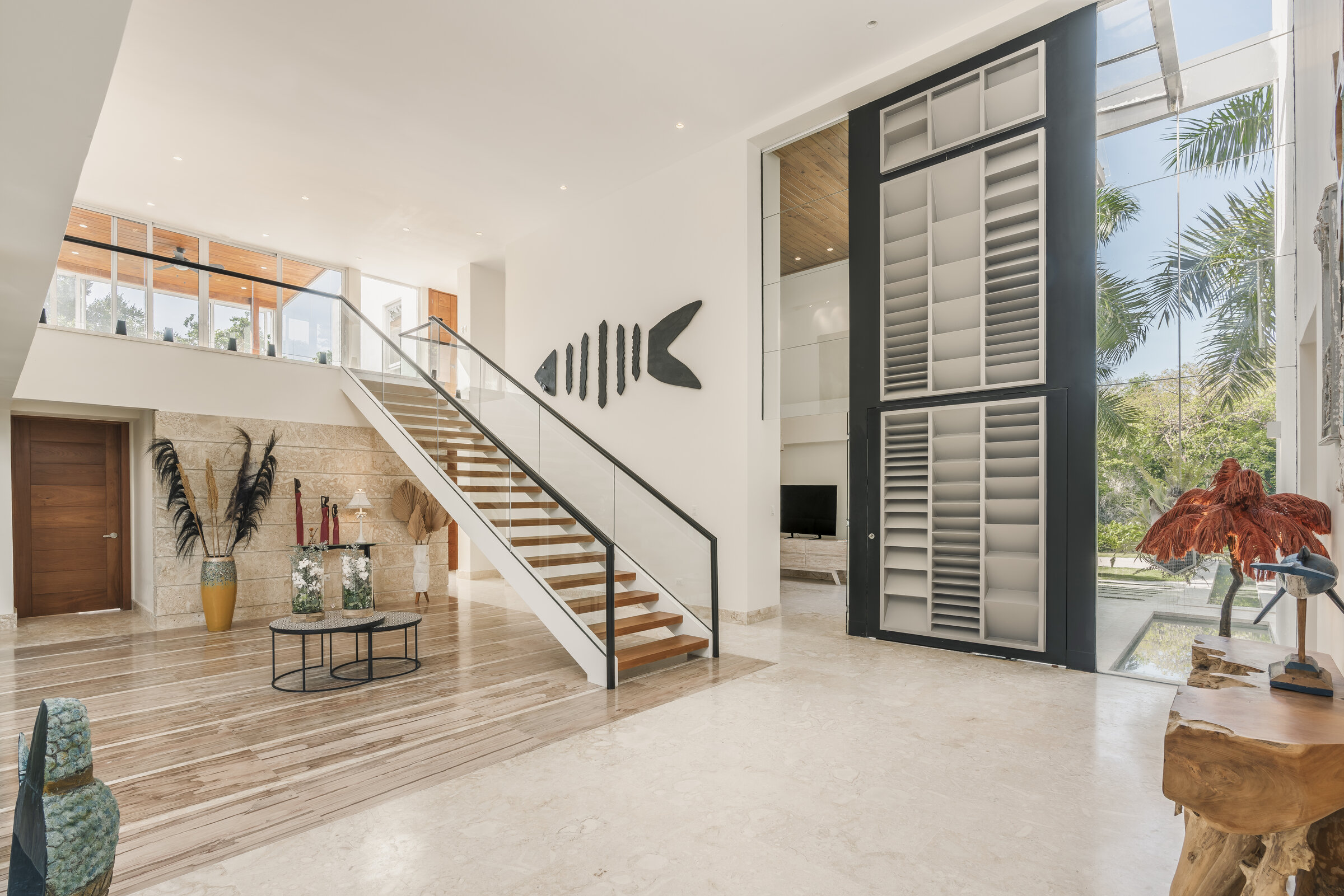 Sala principal Villa Eden Punta Cana — espacio de lujo contemporáneo